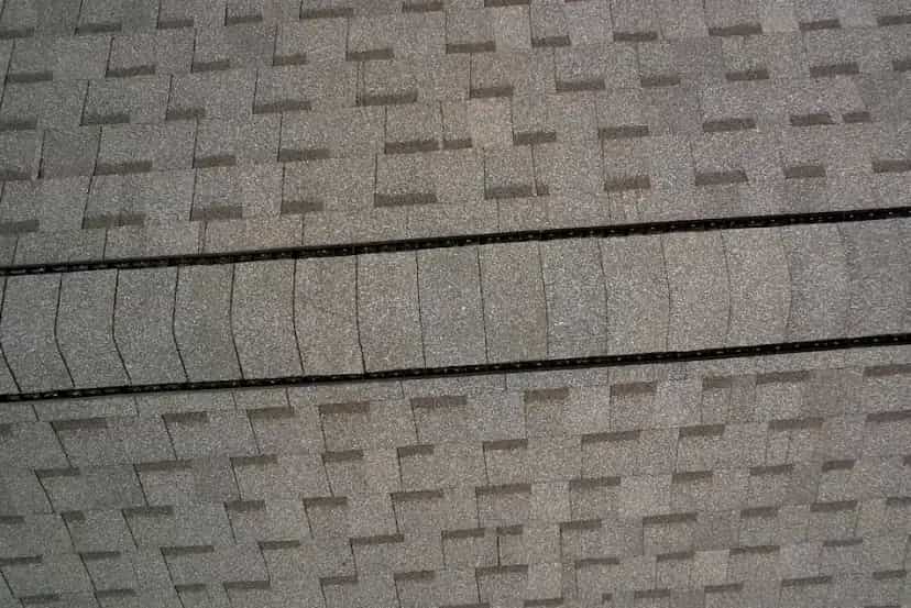Attic Ventilation Services in Michigan - Roofing Army roof ridge exhaust ventilation on a michigan roof
